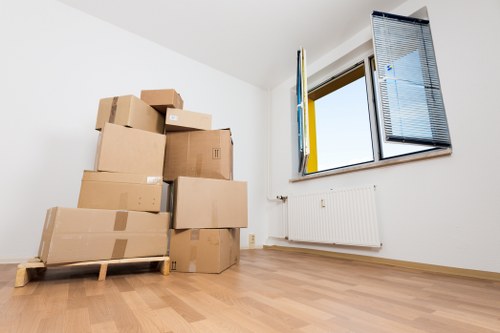 Careful handling of boxes and furniture during a small move in Isleworth