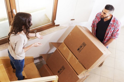Mixed household items and furniture in a typical Isleworth storage job