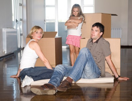 Professional movers handling furniture during Isleworth relocation